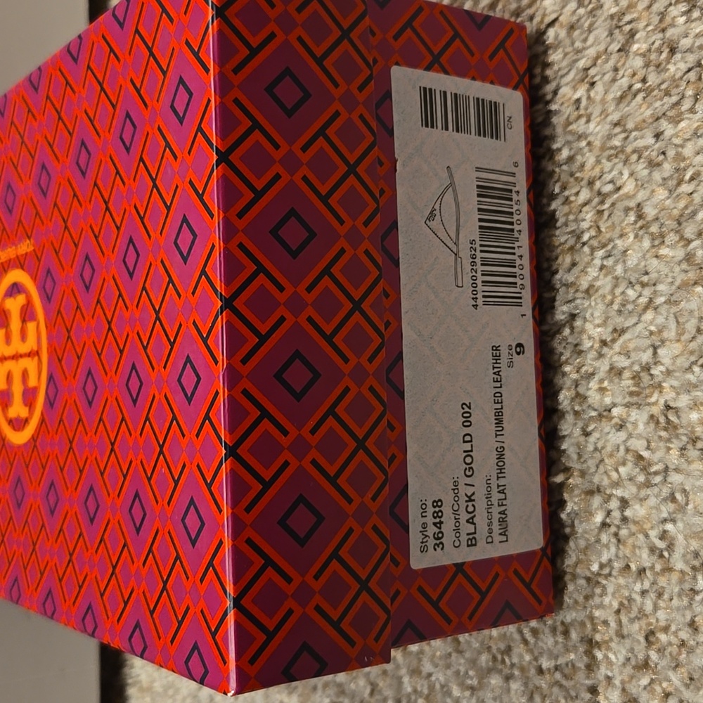 Tory Burch Black Thong Sandals with Gold Emblem - Picture 2 of 4